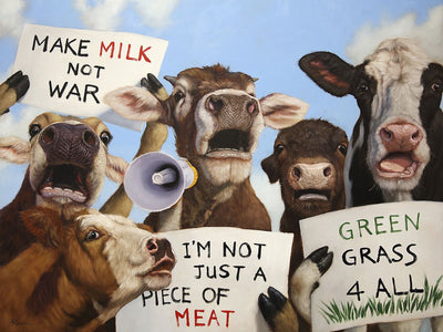 Cows protest while holding signs in the hoofs. One carrying a microphone. The signs read: "Make Milk Not War; I'm Not Just A Piece of Meat; Green Grass 4 All"