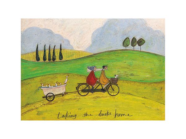 A man in a yellow coat rides a two-seated bicycle with a woman in a red coat. Their white dog sits in the bike basket. A bathtub full of white ducks is towed behind them as they ride along a hill. More hills sprawl in the background.
