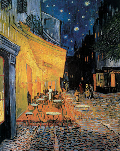 A cafe lights up the city at night. Tables are set up for patrons. Stars glow in the night sky above silhouetted houses.