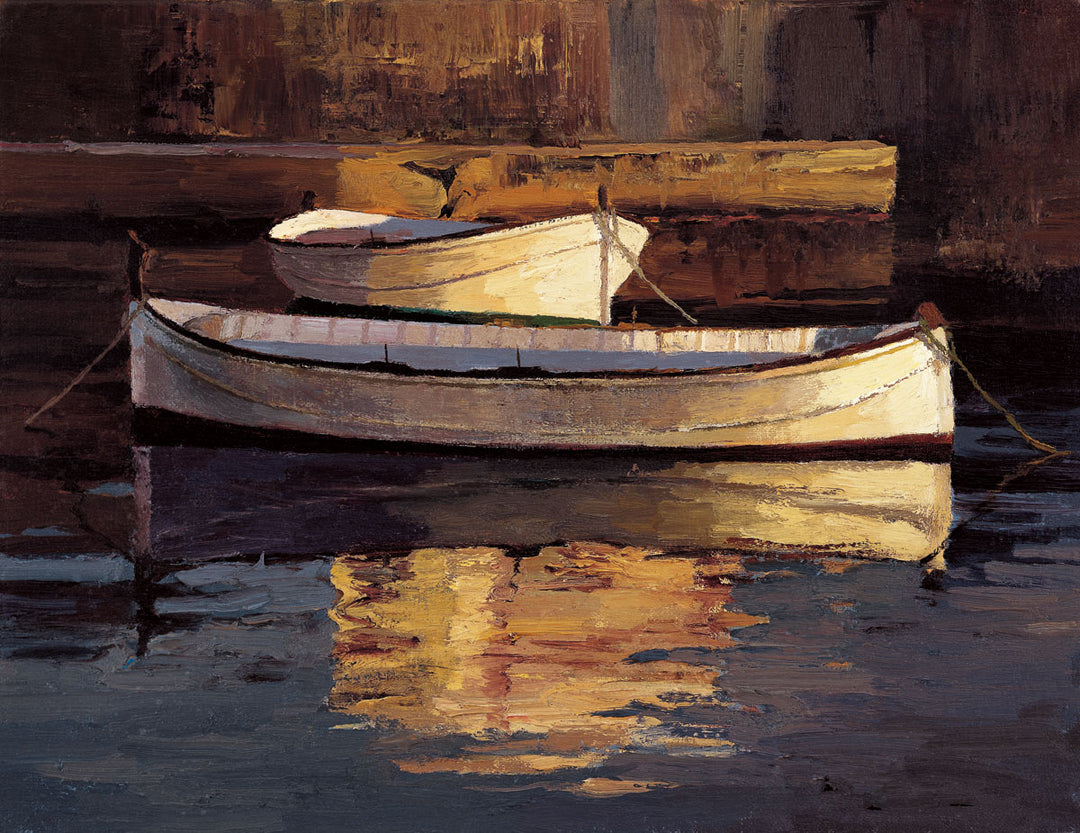 Two canoes with reflection on still waters.