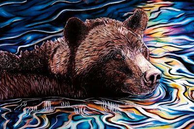 A portrait of a bear swiming through colourful water.