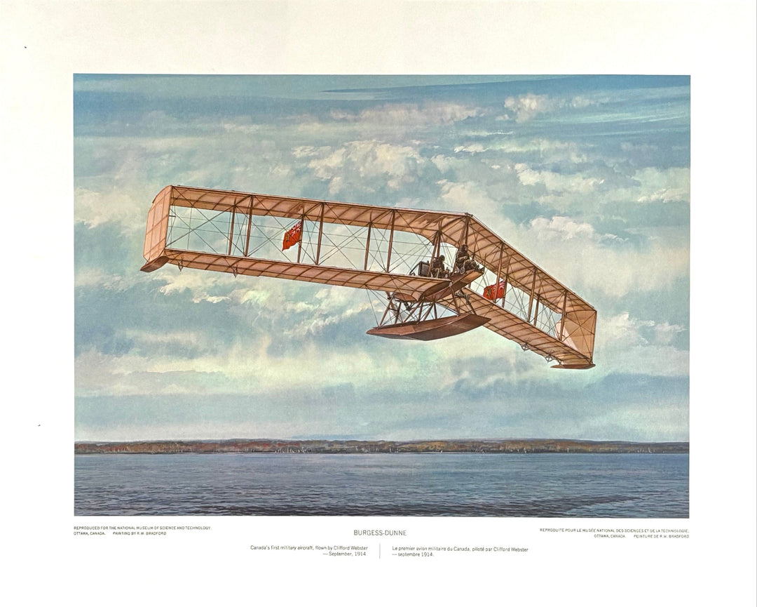 Historical airplane flying over water with a cloudy sky