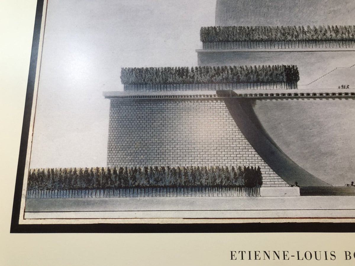 A framed monochrome architectural print or poster showing a stepped building design with rows of trees along the terraces, mounted on a light wall. Partial text at the bottom reads 'ETIENNE-LOUIS B.