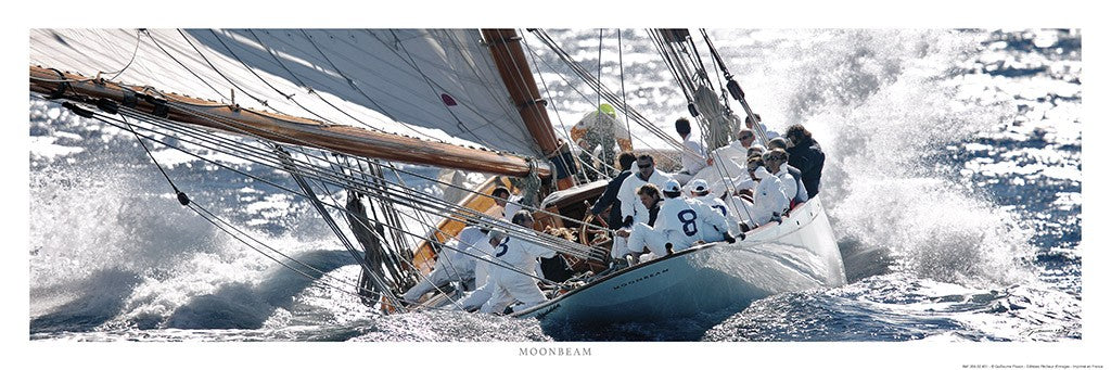 A high-speed sailing race scene with a white sailboat cutting through choppy blue ocean water, with crew members visible on deck. The image has a white border and the word 'MORNINGBEAM' printed at the bottom.