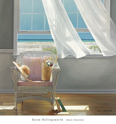 A straw hat and bag of book sit on a white, wicker chair. The chair has red and white pinstriped cushions. A couple of books on the floor rest against the leg of the chair. White curtains billow from the open windows. A beach can be seen through the window. 