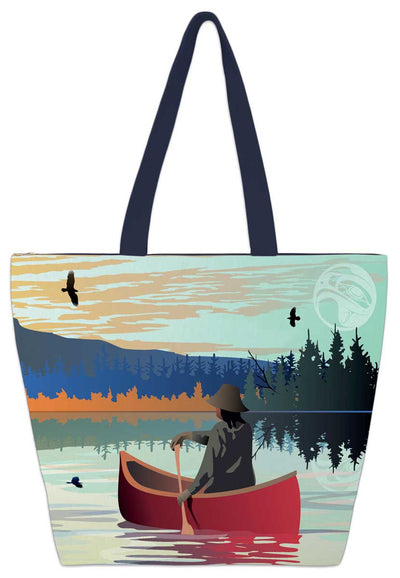 An Indigenous person in a hat paddles through a lake in a red canoe. Trees line the edge of the lake. Birds soar in the sky, the moon faint in the pale sky.  Set on a tote bag.