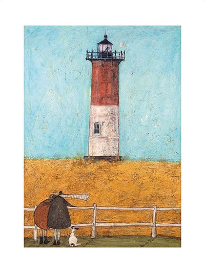 A man in a dark coat has his arm lovingly around a round woman in a brown coat. Their white dog sits next to them. They look up at a red and white lighthouse that sits atop a hill of yellow grass.