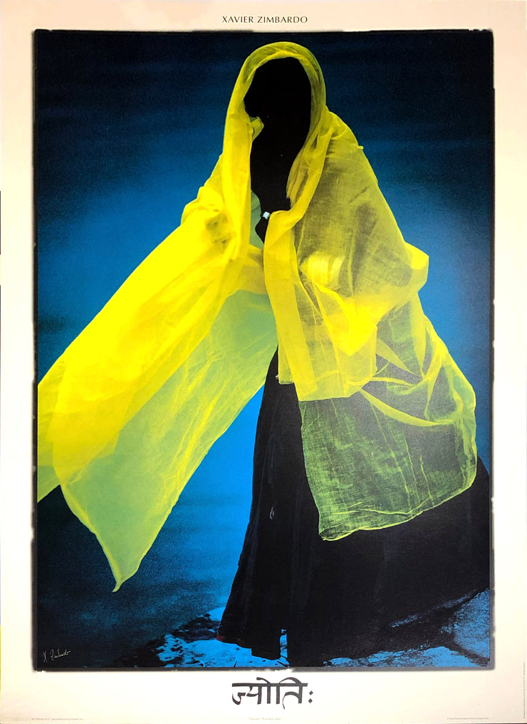 The silhouette of a women who holds a yellow shall around her on a blue background.   Dimensions: 20" x 27.5"