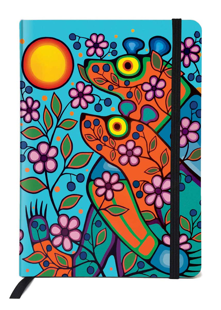 Two colourful bears in an embrace look at the sun. They are surrounded by flowers. Printed on a journal.