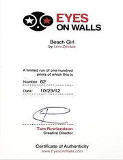 certification slip signed by Tom Rowlandson, creative director.